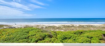 Oceanfront Caswell Beach OIBV 406, a cozy 2-bedroom condo for up to 5 guests.
