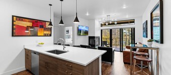 Centrally Located Condo with Private Balcony with Blue River Views!