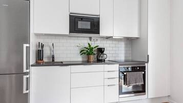 Een koelkast, een oven, een vaatwasser