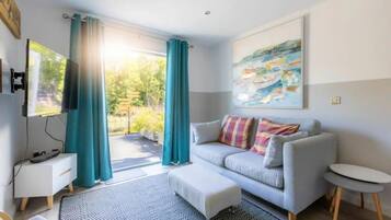 Ferienhaus | Wohnbereich | Fernseher