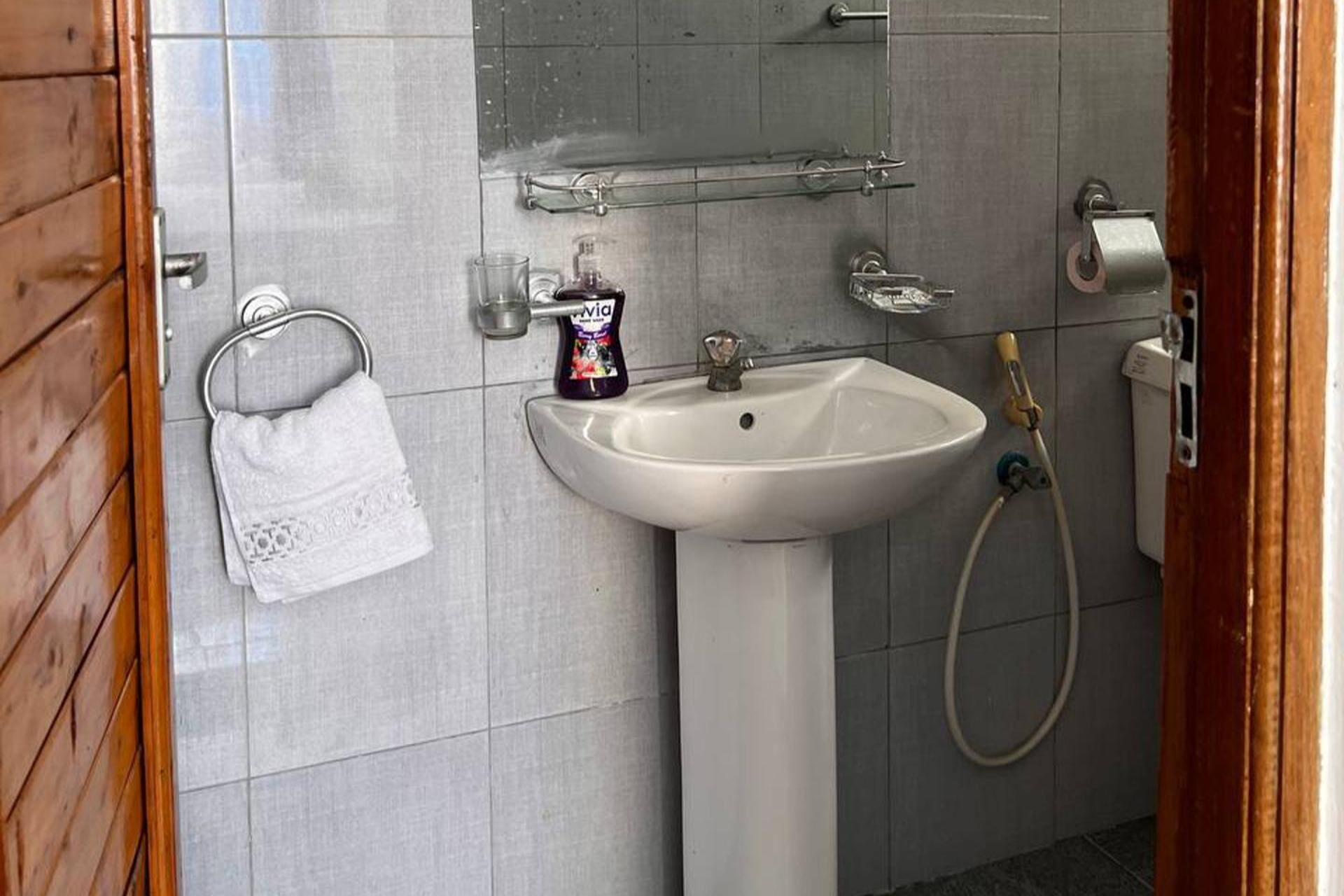 Ducha, toallas y papel higiénico