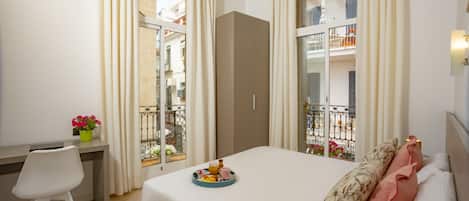 Double Room, Balcony, City View | Desk, laptop workspace, free WiFi, bed sheets