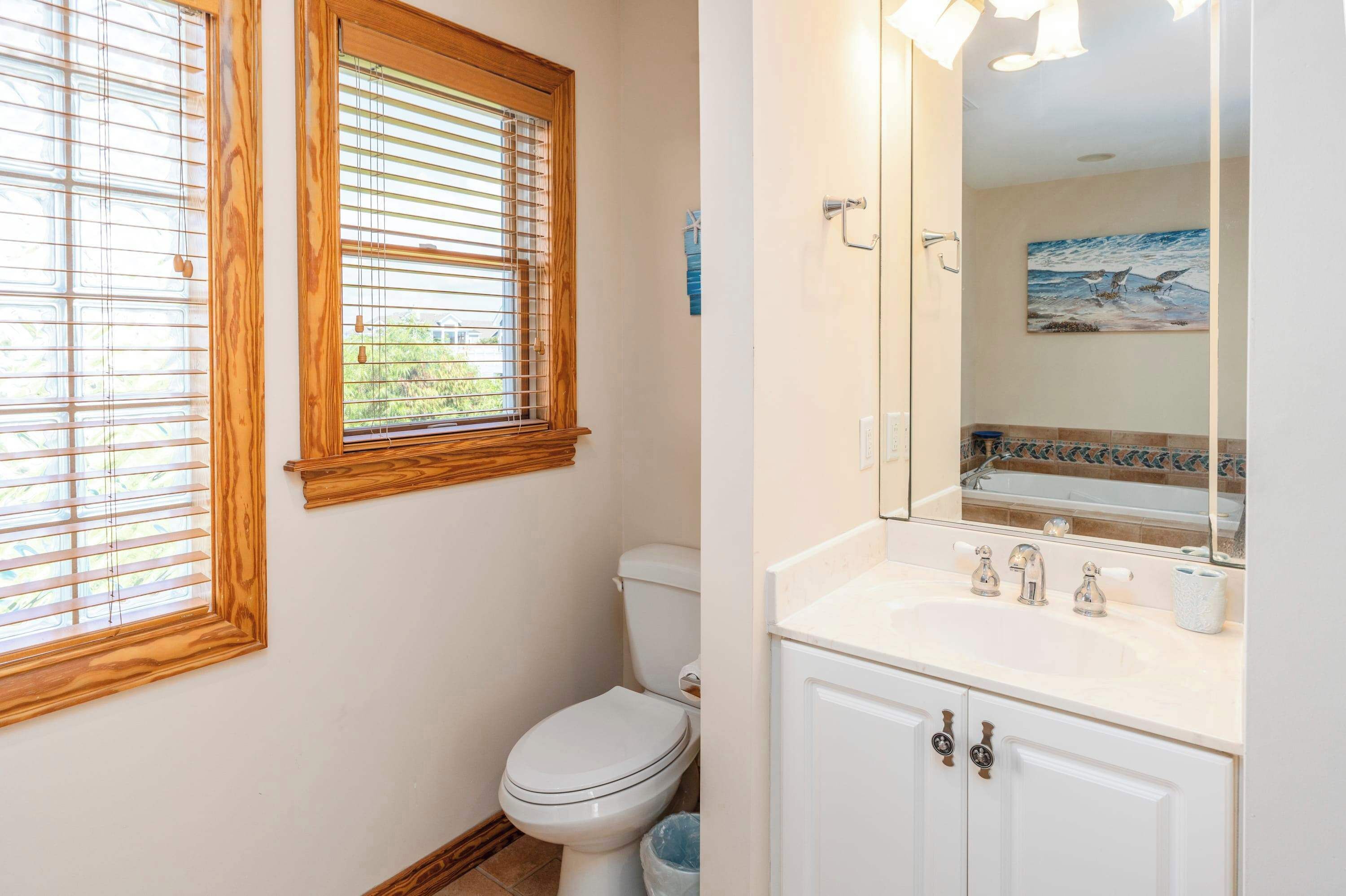 Top Level Master King Ensuite Full Bath with a Walk-In Shower, Tub, Vanity, Toilet and Bright, Functional Design for Everyday Comfort