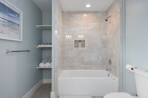 Shower, hair dryer, towels, shampoo