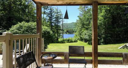 Waterfront home with in-ground pool and stunning views of Pleasant Mountain!