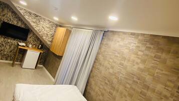 Economy Studio Suite | Desk, laptop workspace, free WiFi