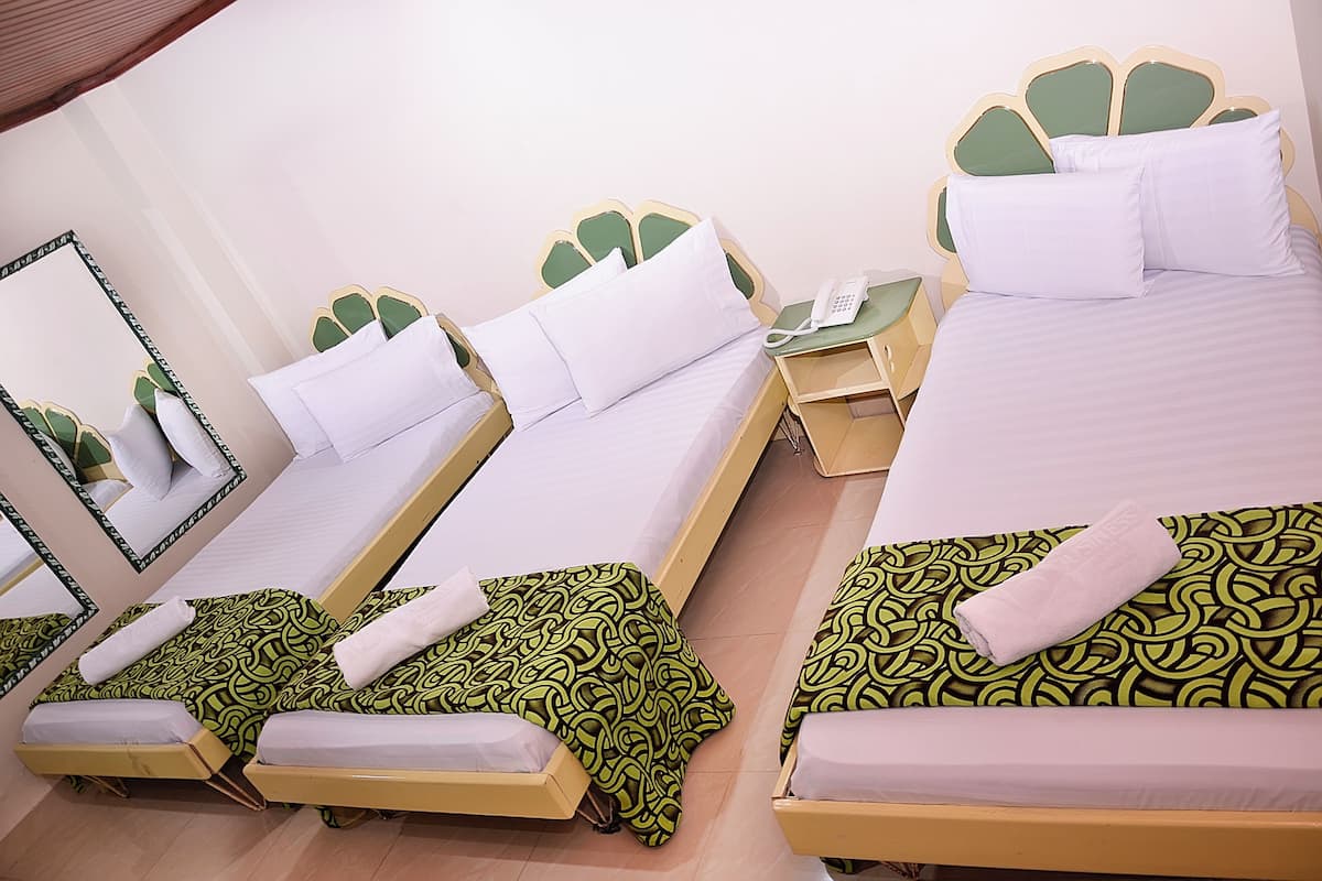 Luxe beddengoed, donzen dekbedden, een minibar, gratis wifi