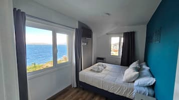 Apartment, 1 Bedroom, Lake View (1) | Premium bedding, down comforters, pillowtop beds, in-room safe