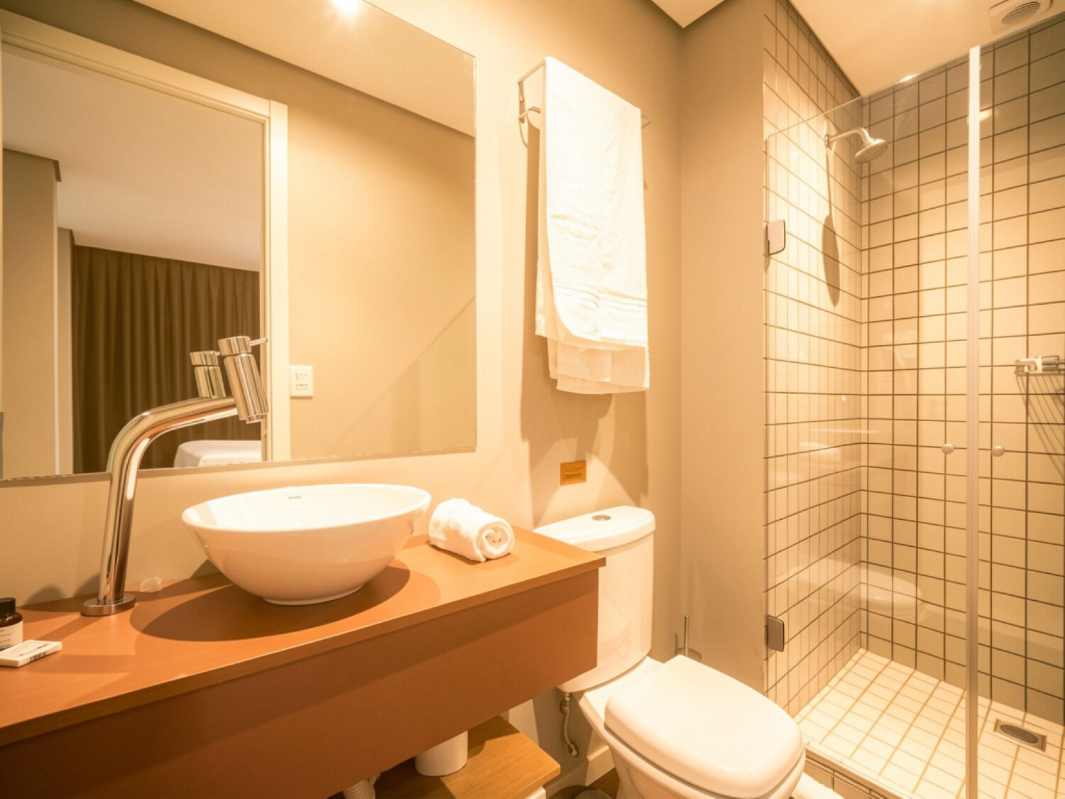 Basic Studio | Bathroom | Rainfall showerhead, hair dryer, towels, soap