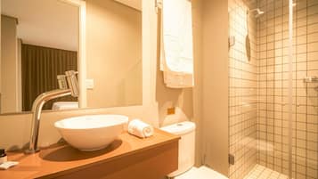 Basic Studio | Bathroom | Rainfall showerhead, hair dryer, towels, soap