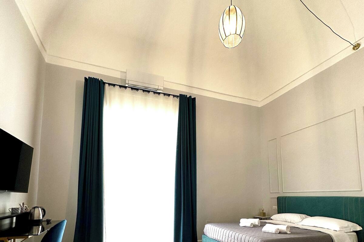 Aurora Room, Balcony, City View | 1 bedroom, down comforters, memory foam beds, minibar