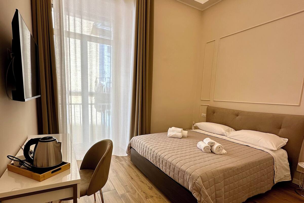 Alba Room, Balcony, City View | Down comforters, memory foam beds, minibar, desk