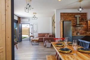 Executive Villa | Living area | 40-inch Smart TV with digital channels