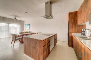 Fridge, microwave, stovetop, coffee/tea maker