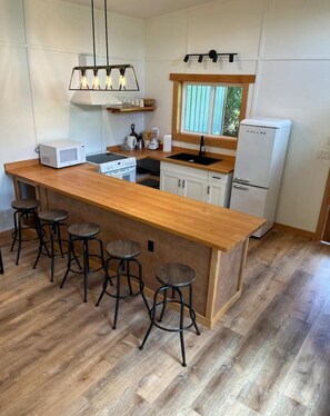 Private kitchen - Cabins on Cortes Island, pet friendly, private near lake on large property. (Mansons Landing)