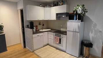 Een koelkast, een oven, een vaatwasser