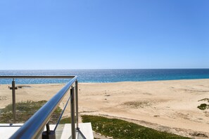 On the beach, sun-loungers, beach towels