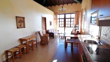 House Peña Villar | Living area | 24-inch flat-screen TV with cable channels