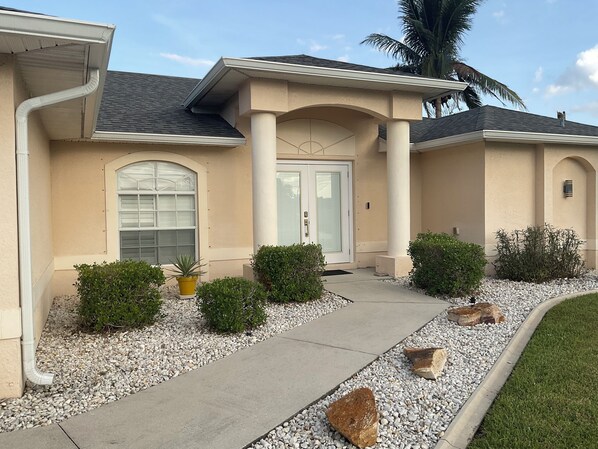 Exterior detail - Remodeled pool home with upscale amenities and features, perfect for relaxing. (Cape Coral)