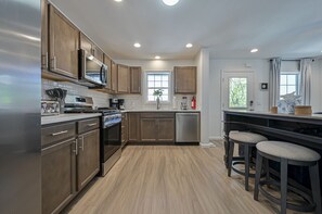 Réfrigérateur, micro-ondes, four, lave-vaisselle