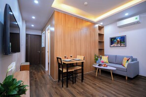 Desk, laptop workspace, free WiFi, bed sheets - Fusion Gates Apartment (Hanoi)