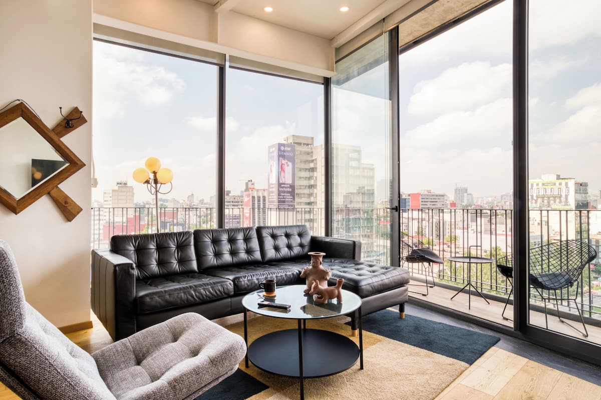 Comfort Apartment | Living area | 32-inch Smart TV with digital channels