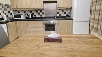 Apartment | Private kitchen | Fridge, microwave, oven, stovetop