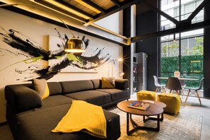Classic Apartment | Living area | 32-inch Smart TV with digital channels