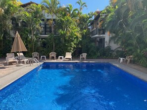 Outdoor pool, a heated pool - Beautiful cozy and charming 1 Bedroom (Puerto Vallarta)