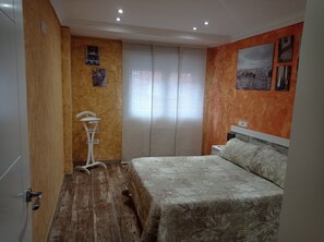 2 dormitorios, tabla de planchar con plancha, wifi y ropa de cama