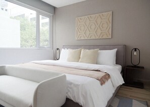 Comfort Apartment | Desk, blackout drapes, iron/ironing board, free WiFi