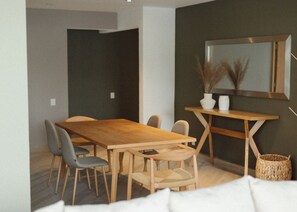 Elite Apartment | Living area | 32-inch Smart TV with digital channels