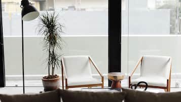 Elite Apartment | Living area | 32-inch Smart TV with digital channels