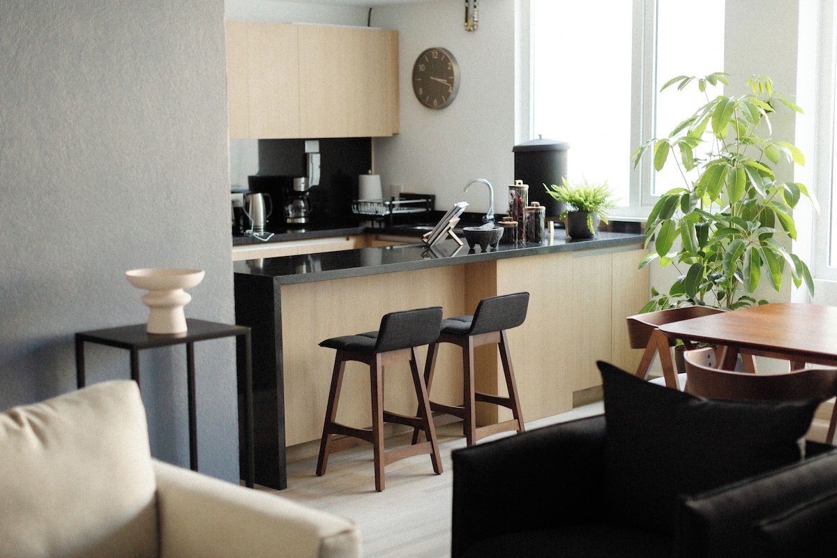 Deluxe Apartment | Living area | 32-inch Smart TV with digital channels