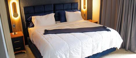 Luxe beddengoed, een kluis op de kamer, verduisterende gordijnen