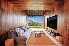 Exclusive Villa | Living area | 60-inch TV with digital channels