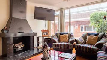 35-inch Smart TV with cable channels, Netflix, streaming services