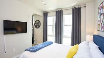 1 bedroom, desk, iron/ironing board, travel crib