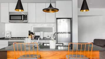Junior Apartment | Living area | 42-inch flat-screen TV with digital channels