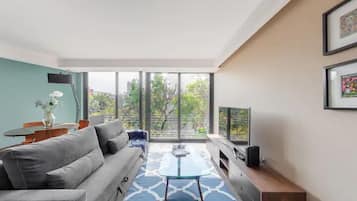 Basic Apartment | Living area | 42-inch flat-screen TV with digital channels