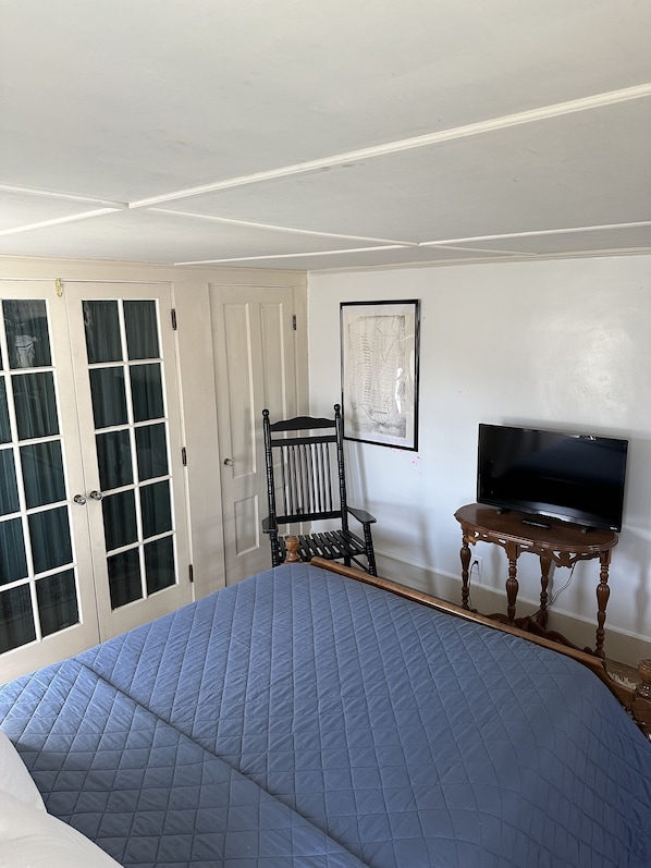 1 bedroom, desk, iron/ironing board, travel crib
