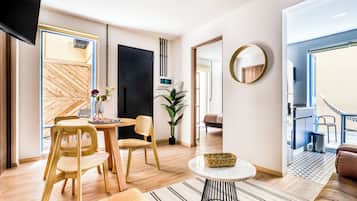 Classic Apartment | Living area | 32-inch Smart TV with digital channels