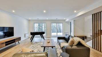 Smart TV, fireplace, foosball