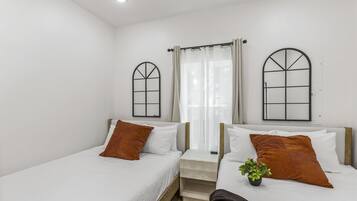 4 bedrooms, desk, iron/ironing board, travel crib