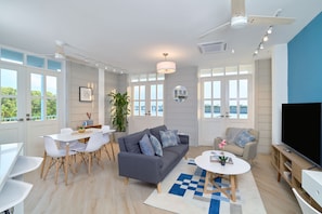 Appartement (1D) | Coin séjour | TV connectée de 40 pouces avec chaînes par câble