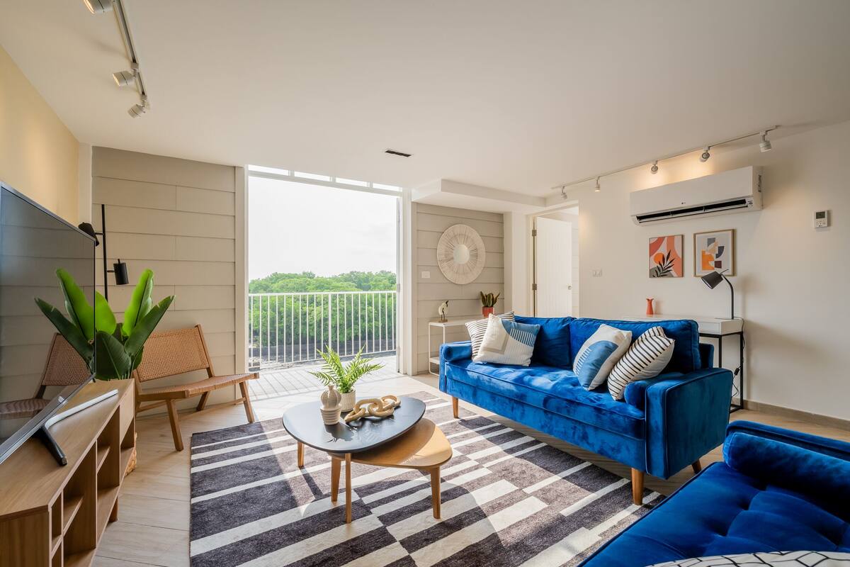 Apartment, 3 Bedrooms (3A) | Living area | 40-inch Smart TV with cable channels