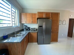 Private kitchen - Tranquil Oasis Fully Stocked to make you feel like you are at home. (Santiago de los Caballeros)