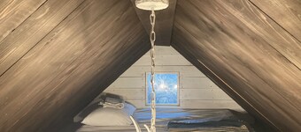 Tiny home nestled in a small patch of forest 20 minutes south of San Antonio.