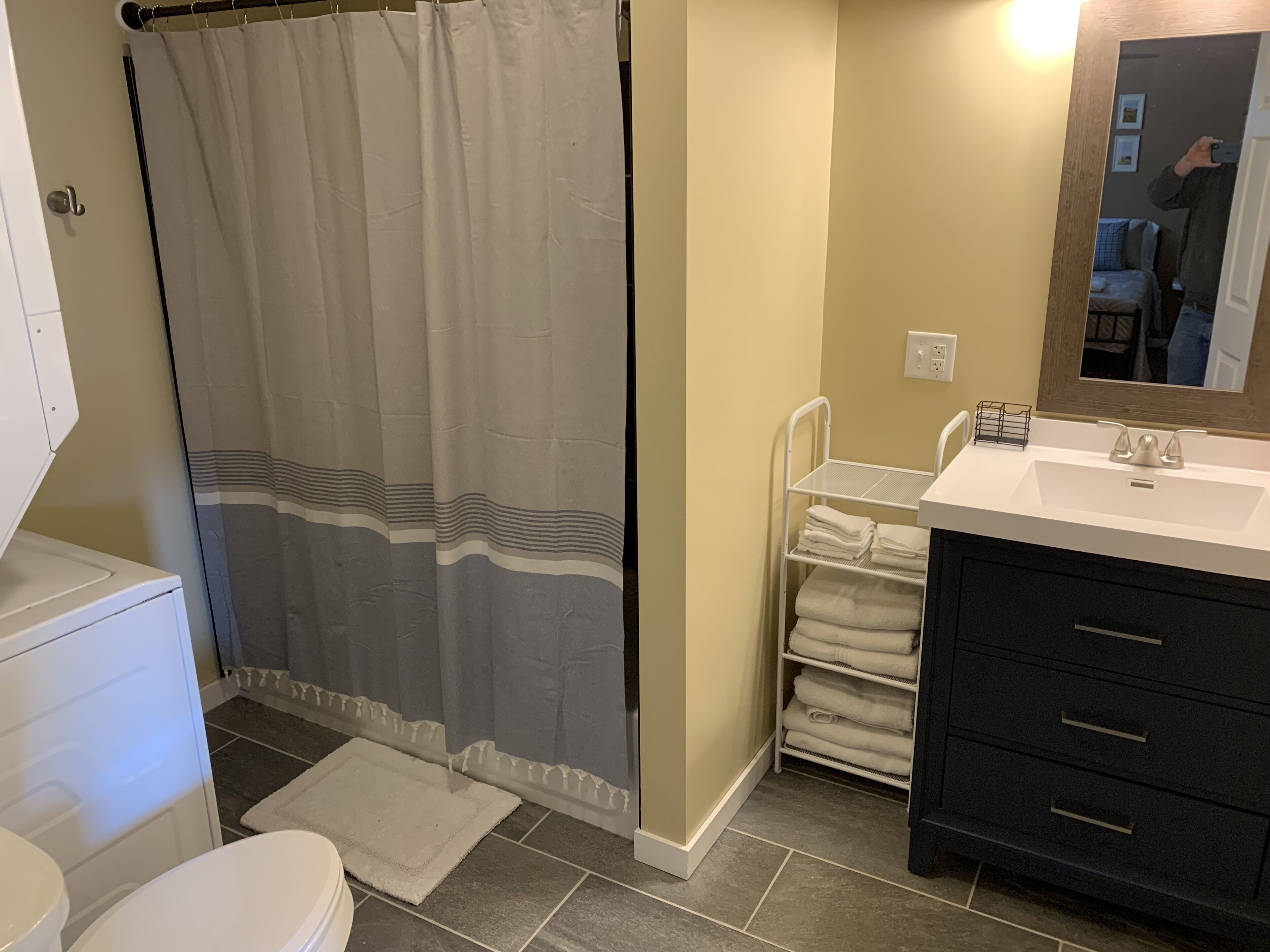 Hair dryer, towels, soap, shampoo