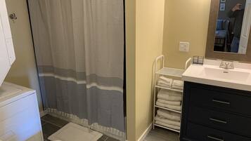 Hair dryer, towels, soap, shampoo